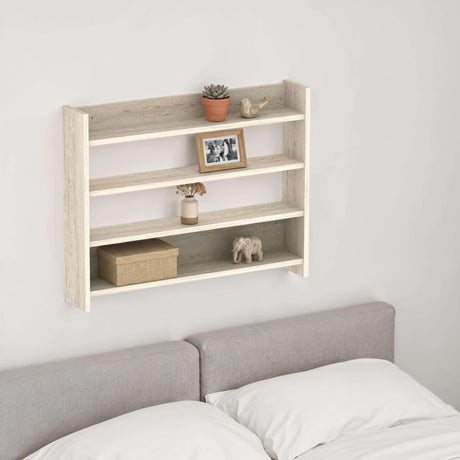 Decortie Wall Shelf with three shelves, styled with plants and decor above a bed