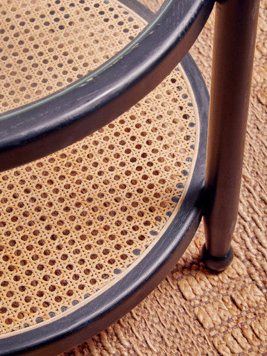 Orsina Side Table featuring a stylish rattan shelf and sleek metal frame for modern interiors