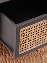 Orsina Side Table featuring a stylish woven drawer front with modern black finish