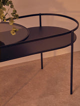Orsina Side Table with a sleek black design and an oval top for modern living spaces