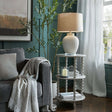 Stylish Shades 4 Seasons side table with two tiers and decorative lamp in a modern living room setting