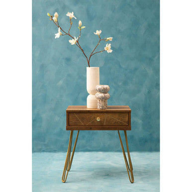 Orsina Side Table with a drawer, styled with a vase and decorative items against a blue backdrop