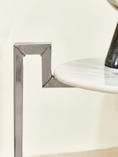 Orsina Side Table with a sleek marble top and modern metal base design