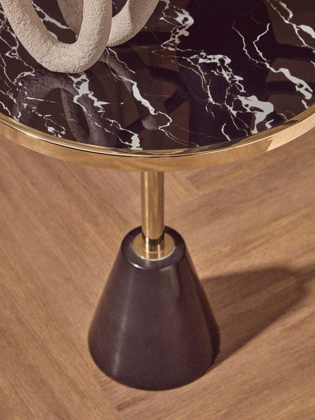Orsina Side Table with a black marble top and gold edges, featuring a stylish cone-shaped base