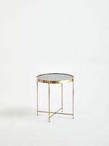 Orsina Gold Side Table with a sleek round black top and elegant metal frame