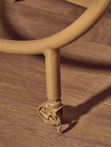 Orsina Side Table featuring sturdy wheels for easy mobility and a modern design