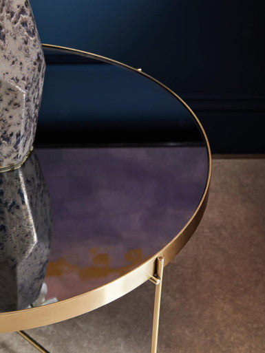 Orsina Side Table with a sleek gold frame and reflective glass top, perfect for modern decor