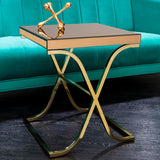 Orsina Side Table with a sleek mirrored top and elegant gold metal legs for modern interiors