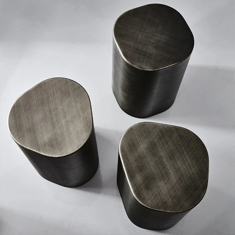 Set of three modern side tables in a brushed metal finish perfect for contemporary living spaces