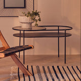 Stylish Orsina Side Table with a modern design featuring a sleek black top and elegant legs
