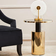 Orsina elegant side table with a gold finish and a stylish lamp for modern decor