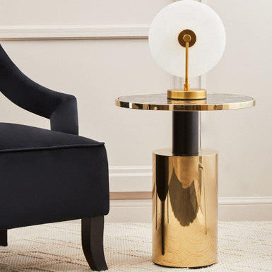 Orsina elegant side table with a gold finish and a stylish lamp for modern decor