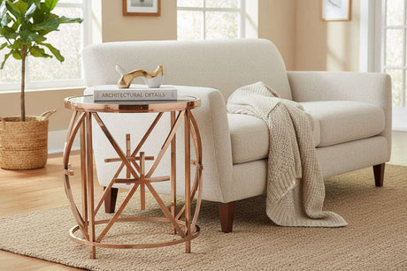 Stylish Orsina Side Table in Rose Gold with Geometric Design Beside a Cozy Sofa