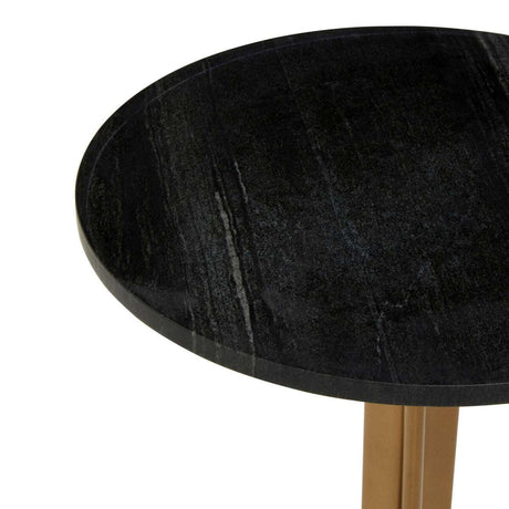 Orsina Side Table with a round black marble top and a sleek gold base for modern home decor
