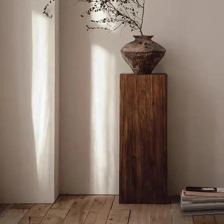 Nisu Home Wooden Side Table with a Decorative Vase and Soft Ambient Lighting