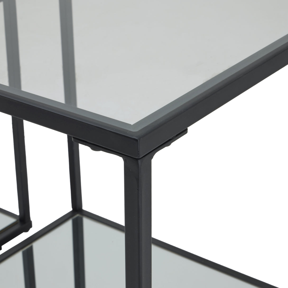 Modern Shades 4 Seasons side tables featuring sleek glass tops and sturdy metal frames