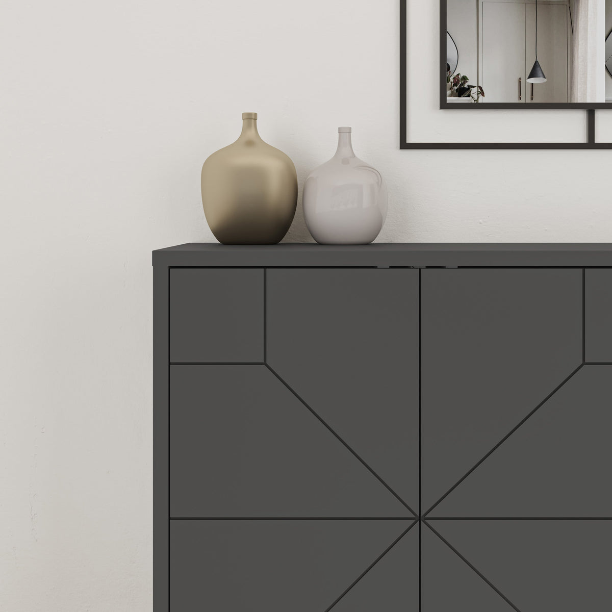 Decortie Sideboard in a modern design with decorative vases on top and a stylish mirror behind
