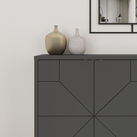 Decortie Sideboard in a modern design with decorative vases on top and a stylish mirror behind