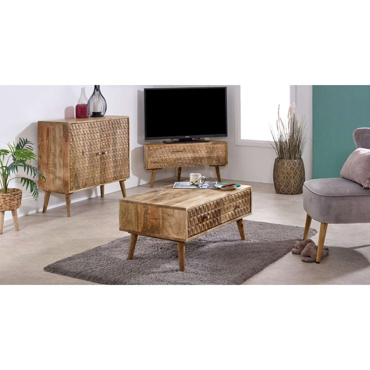 Verty Furniture stylish sideboard in natural wood finish, featuring intricate carving and sleek legs