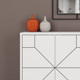 Modern white Decortie sideboard with geometric design and decorative vases on top