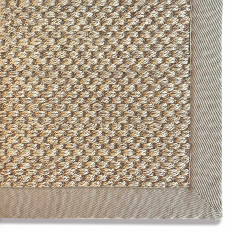 Natural coloured Sisal Rug with a textured weave and bordered edges for a stylish home accent