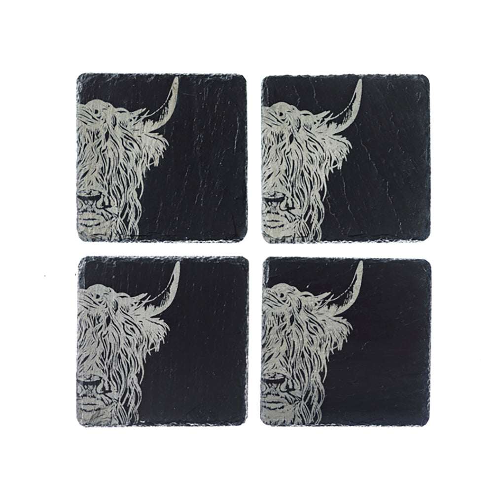 Set of four Selbrae House Slate Placemats featuring Highland Cow designs for stylish dining