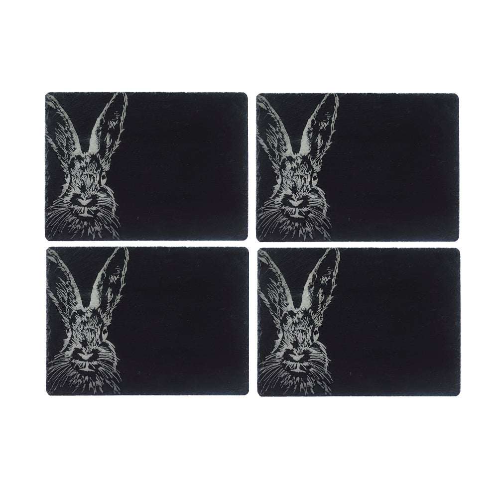Set of four slate placemats featuring a detailed rabbit design for stylish dining