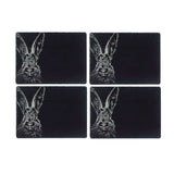 Set of four slate placemats featuring a detailed rabbit design for stylish dining