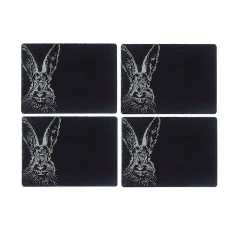 Set of four slate placemats featuring a detailed rabbit design for stylish dining