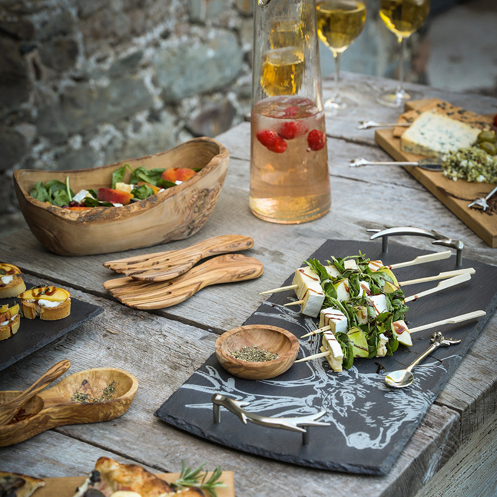 Stylish Selbrae House Serving Tray with assorted appetisers and elegant utensils on a rustic table