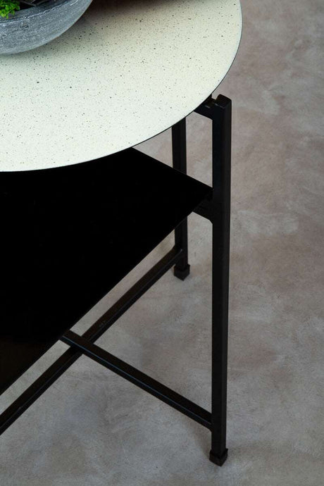 Orsina Side Table with a sleek black base and a speckled white tabletop design