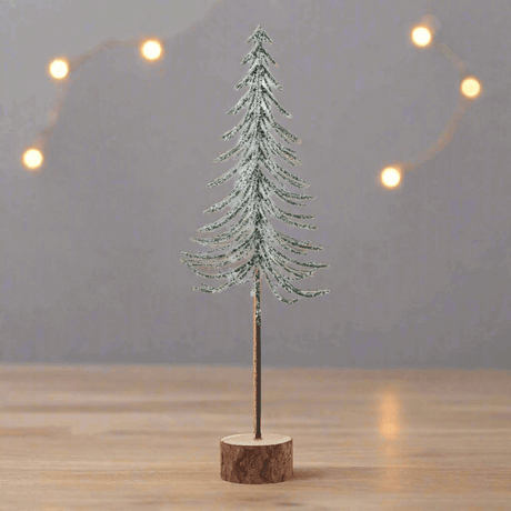 Small Snowy Spindle Tree In Wood Log Shades 4 Seasons