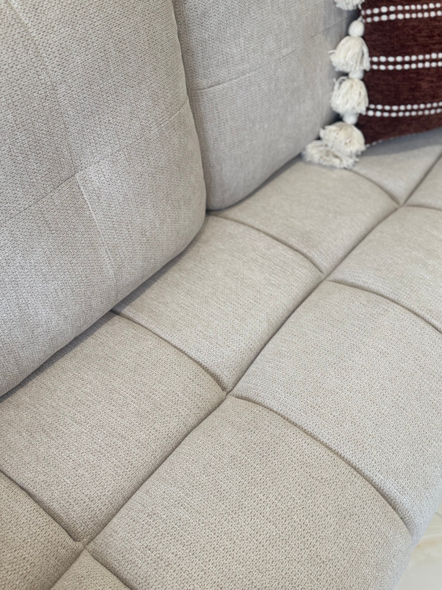 Comfortable grey 2-Seater Sofa with soft fabric and stylish quilted design