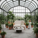 Stylish Orsina 2 Seater Sofa in a Modern Greenhouse Surrounded by Lush Plants