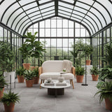 Stylish Orsina 2 Seater Sofa in a Modern Greenhouse Surrounded by Lush Plants