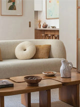 Nisu Home Sofa in Cream with Plush Cushions Set in a Cozy Living Room Environment