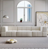 Modern Nisu Home sofa in cream upholstery with a minimalist design and geometric shapes