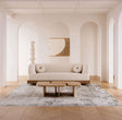 Elegant Nisu Home Sofa in a modern living space with neutral decor and wooden coffee table
