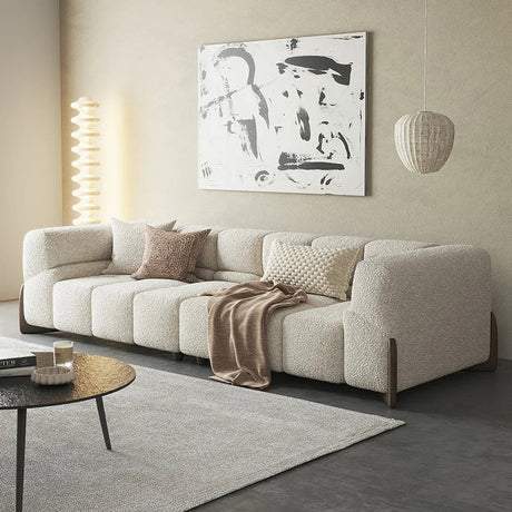 Modern Nisu Home Sofa in light fabric with a cozy design, perfect for contemporary living spaces