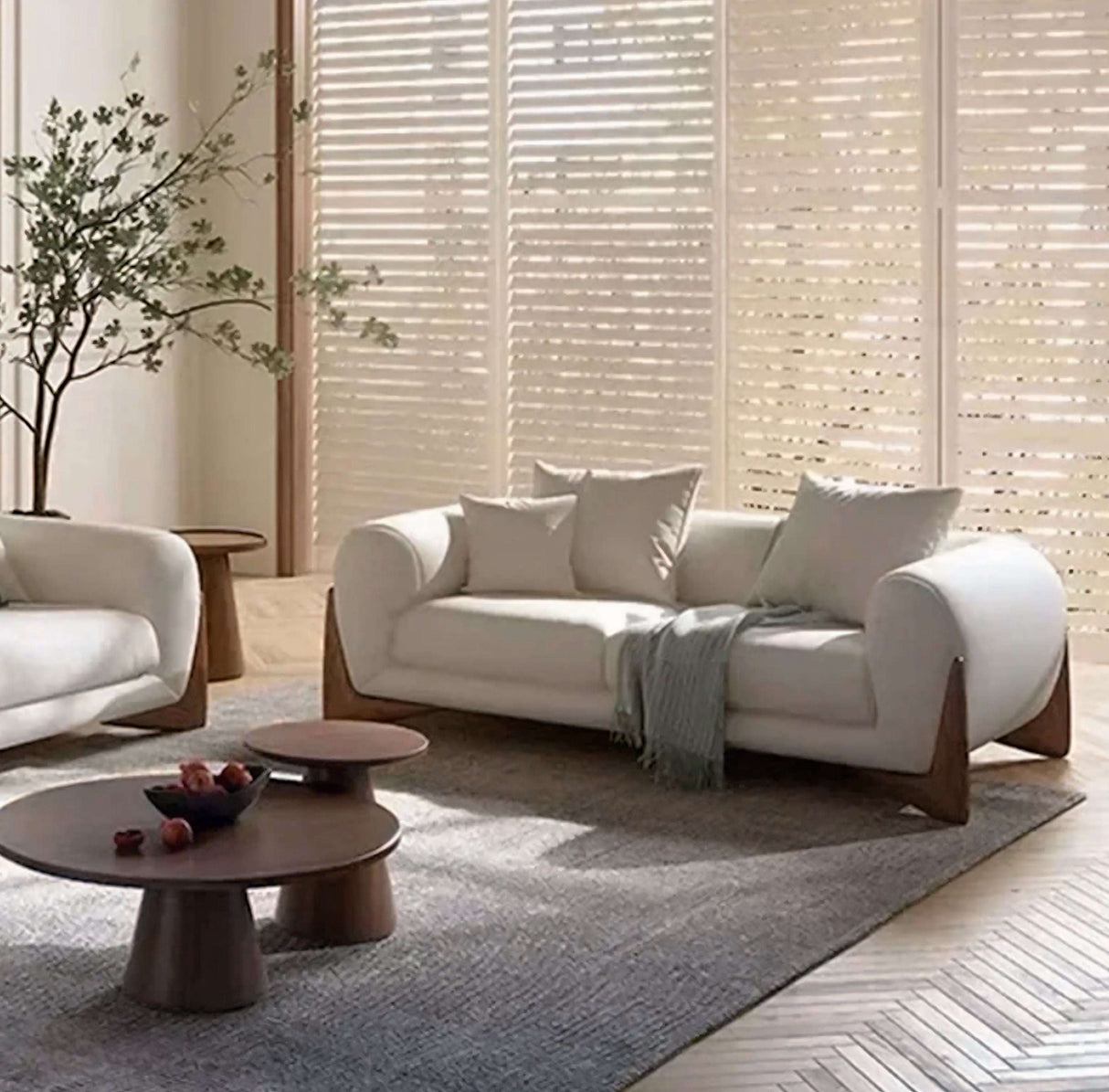 Elegant Nisu Home Sofa in light fabric with wooden legs and soft cushions for modern living spaces