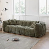 Nisu Home plush green sofa with a contemporary design and comfy cushions for stylish interiors