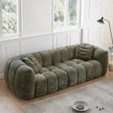 Stylish Nisu Home sofa in green fabric with plush cushions for modern living spaces