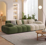 Modern Nisu Home Sofa in green and cream with plush cushions for stylish living rooms