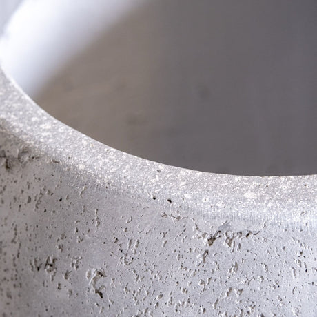 Close-up of Jobu Home Sphere Planter featuring textured concrete finish for contemporary plant display