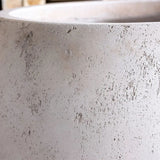 Jobu Home Sphere Planter in natural stone finish, ideal for modern indoor gardens
