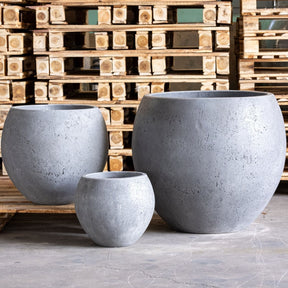 Set of three grey Sphere Planters with a modern design, perfect for indoor or outdoor plants