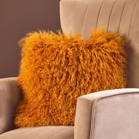 Orsina Square Cushion in vibrant orange with fluffy texture, perfect for adding comfort to any chair