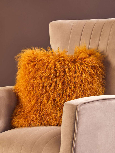 Orsina Square Cushion in vibrant orange with textured, fluffy design for stylish home decor