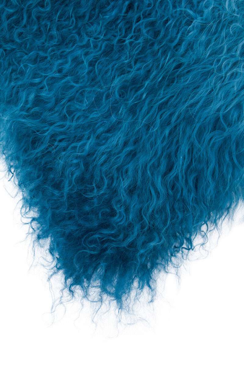 Orsina Square Cushion in vibrant turquoise with a soft, textured shaggy design