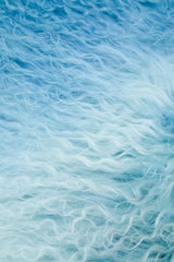 Soft Blue Square Cushion with a Textured Surface for Stylish Home Decor